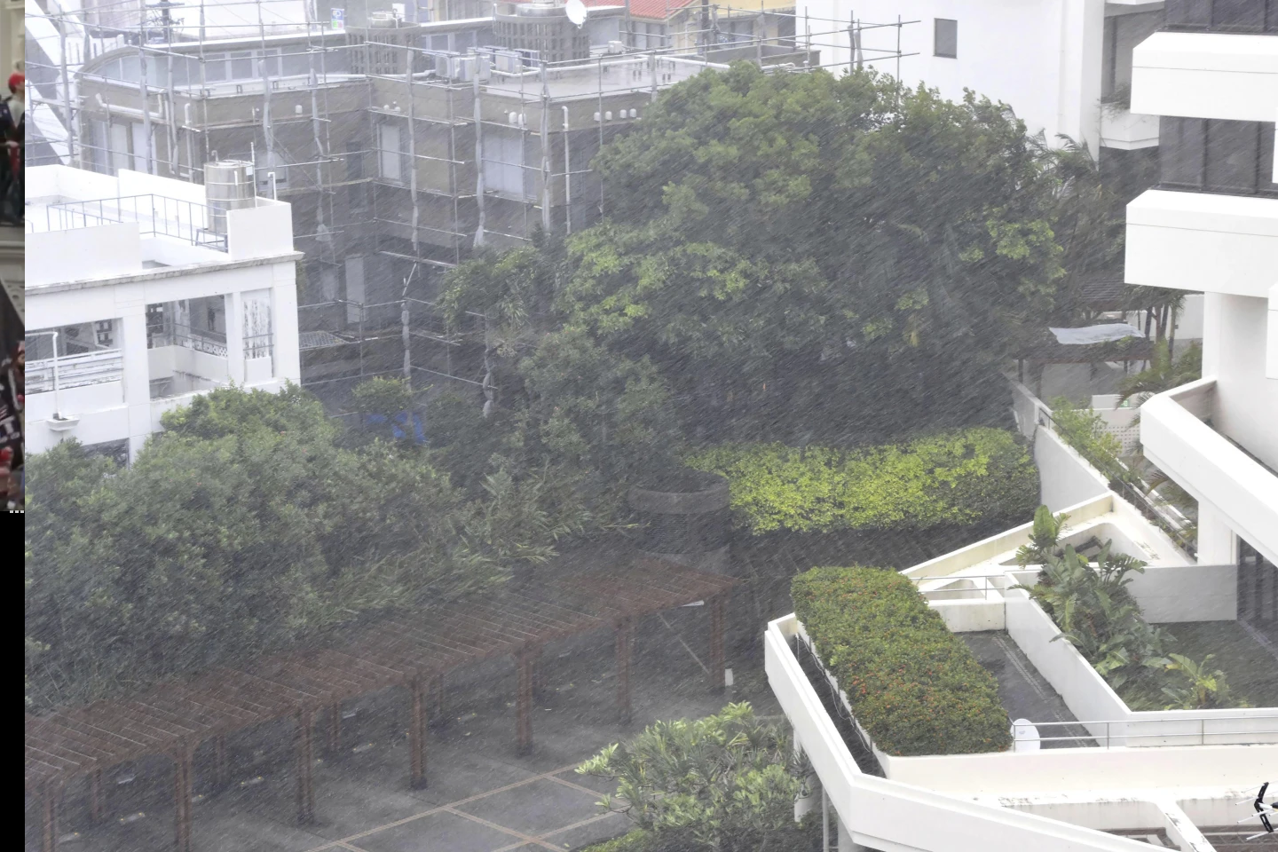 A powerful typhoon pounds Japan’s Okinawa and injures more than 30 people as it moves toward China