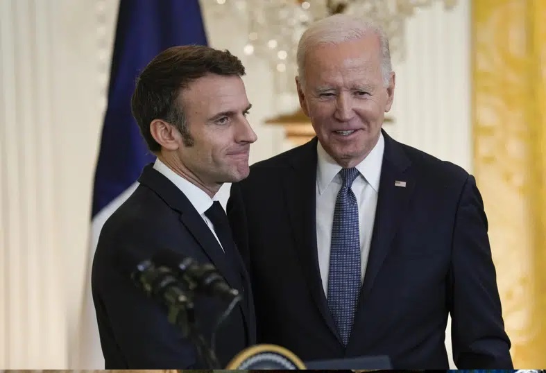 Biden, Macron vow unity against Russia, discuss trade row