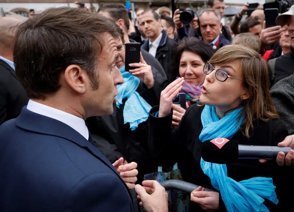 France’s Macron heckled by crowd angry over pensions