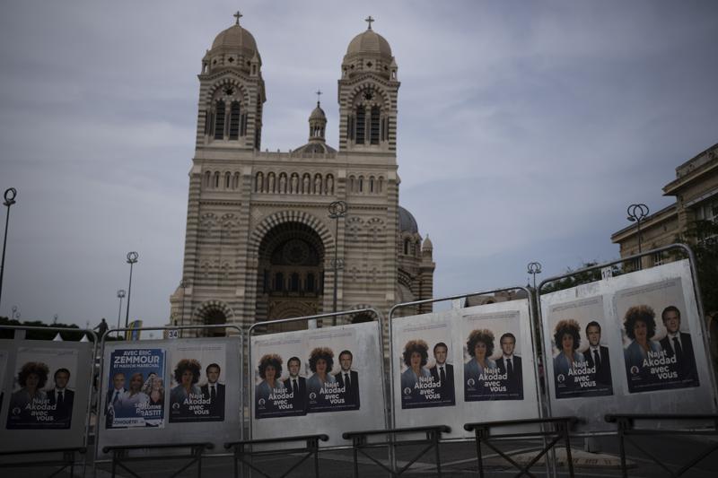 French voters elect parliamentarians, in test for Macron