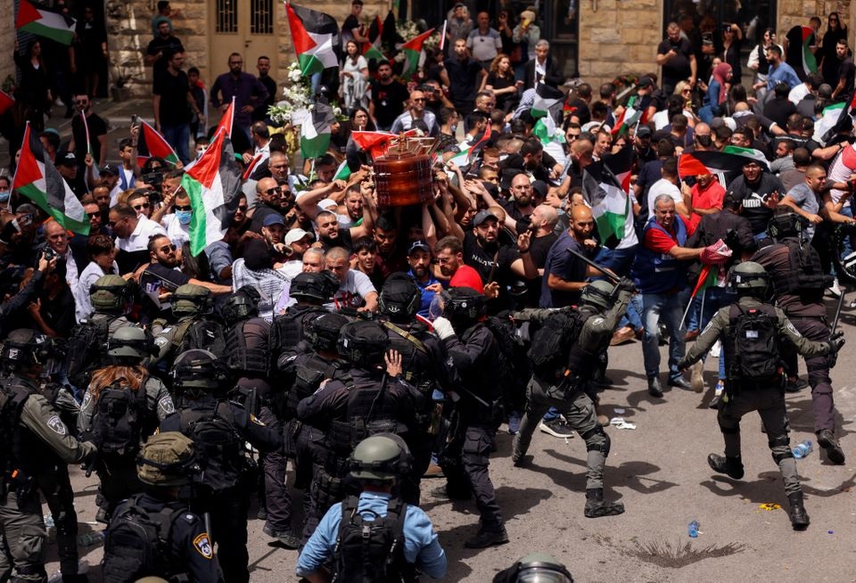 Israel arrests pallbearer beaten at journalist's funeral