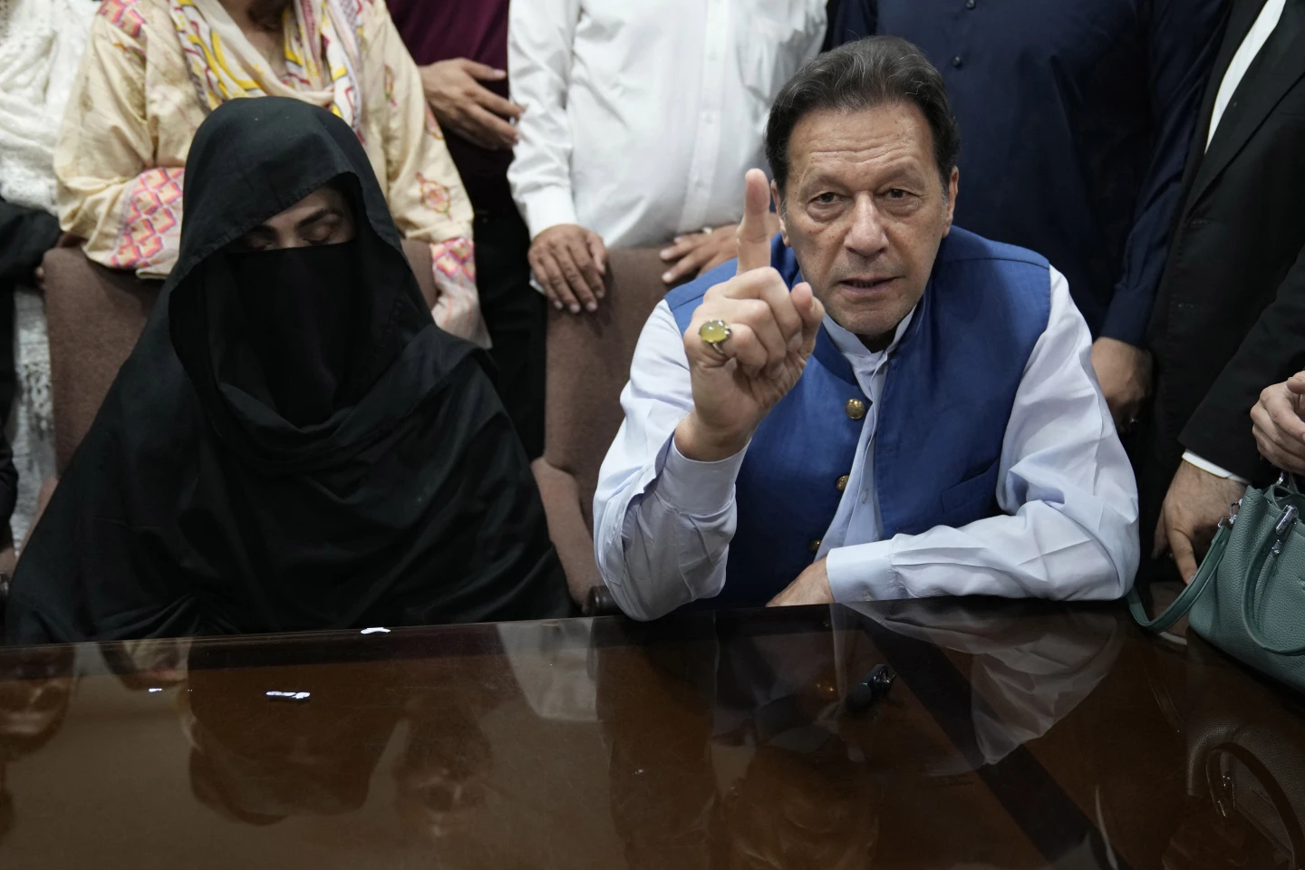 Pakistani court sentences ex-PM Imran Khan and his wife to 14 and 7 years in prison in graft case