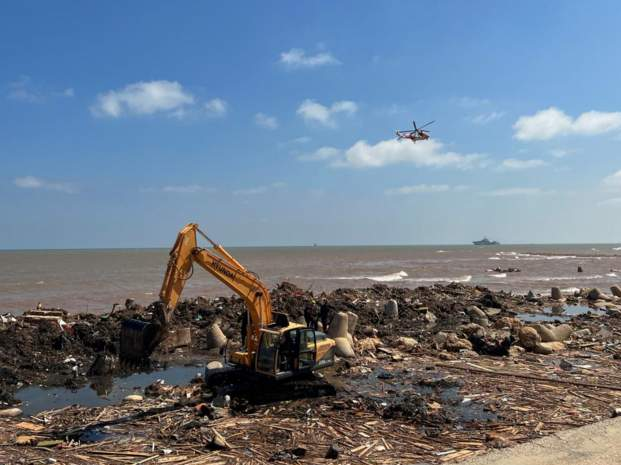 Searchers look for more than 10,000 missing in flooded Libyan city where death toll eclipsed 11,000