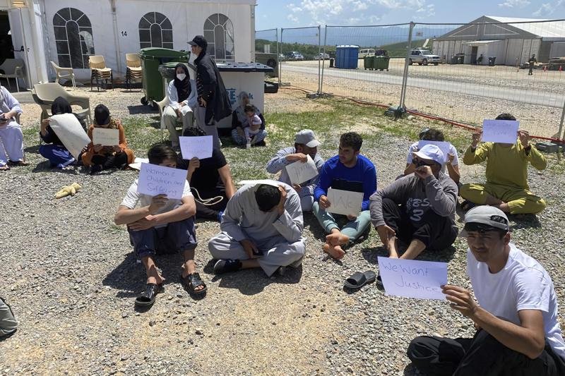 Security concerns leave Afghan evacuees stuck in Balkan camp