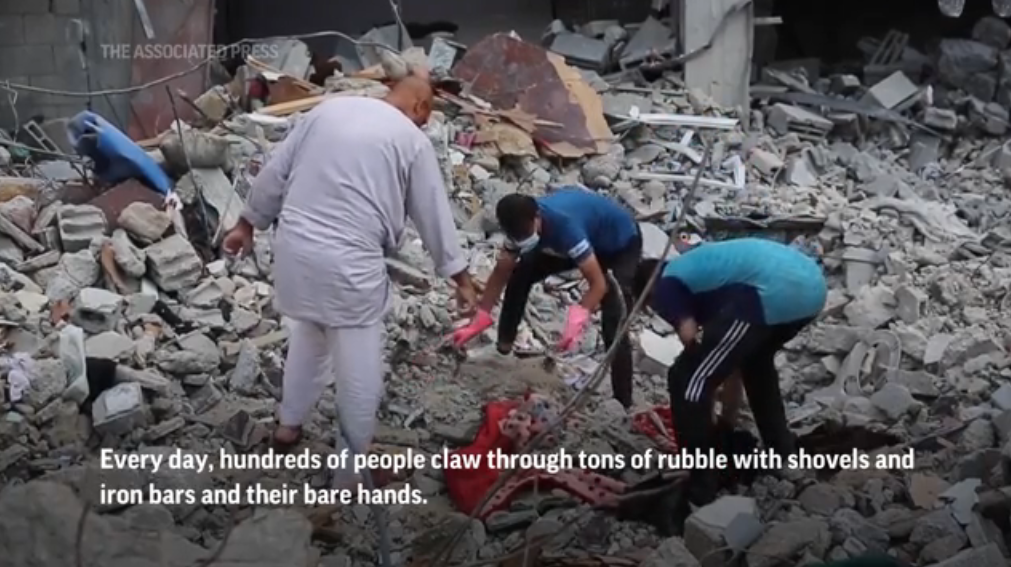 Thousands of bodies lie buried in rubble in Gaza. Families dig to retrieve them, often by hand